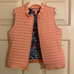 Lilly Pulitzer pink puffer bed with fringe hem